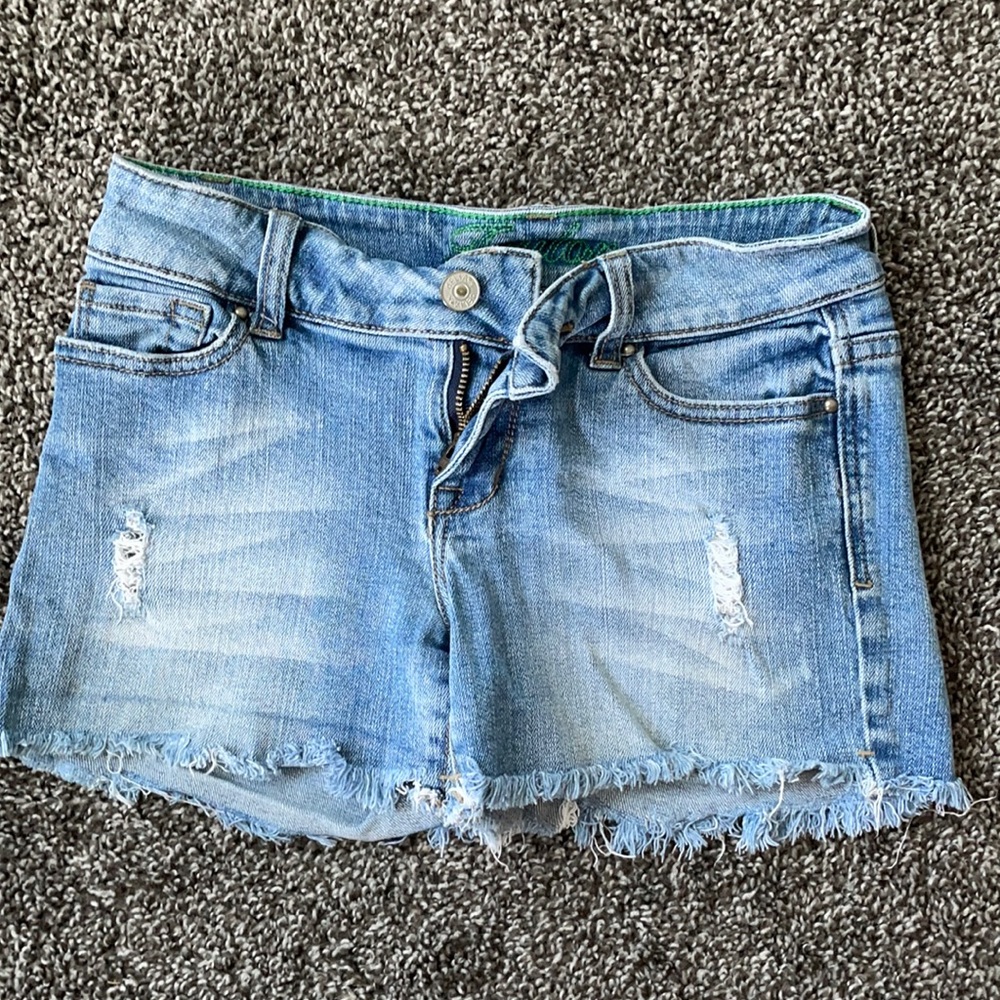 Delia’s destructed jean shorts